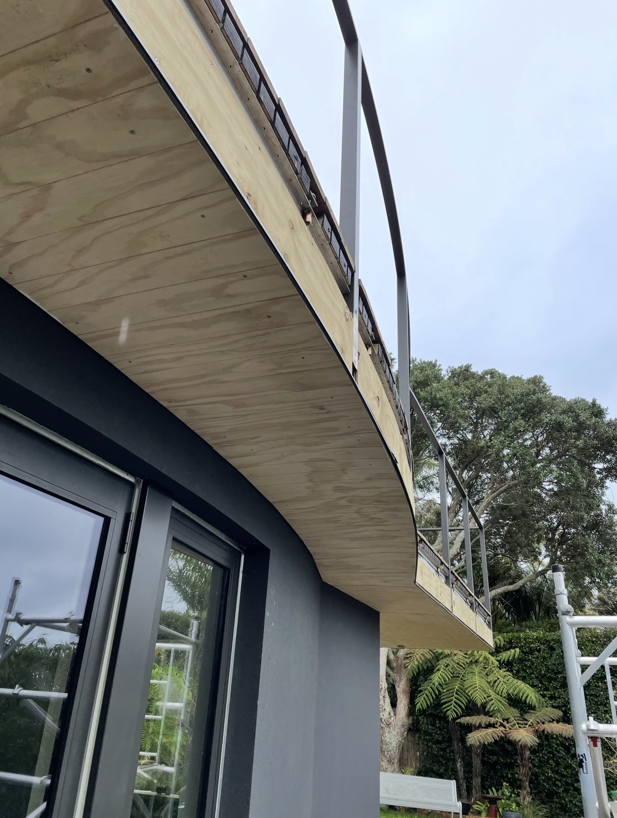 The curved deck edge and underside detail.