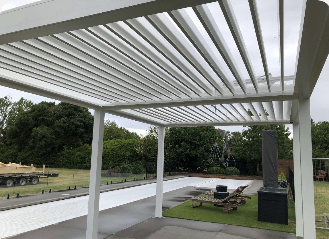 Roof louvres fitted to the poolside pergola.