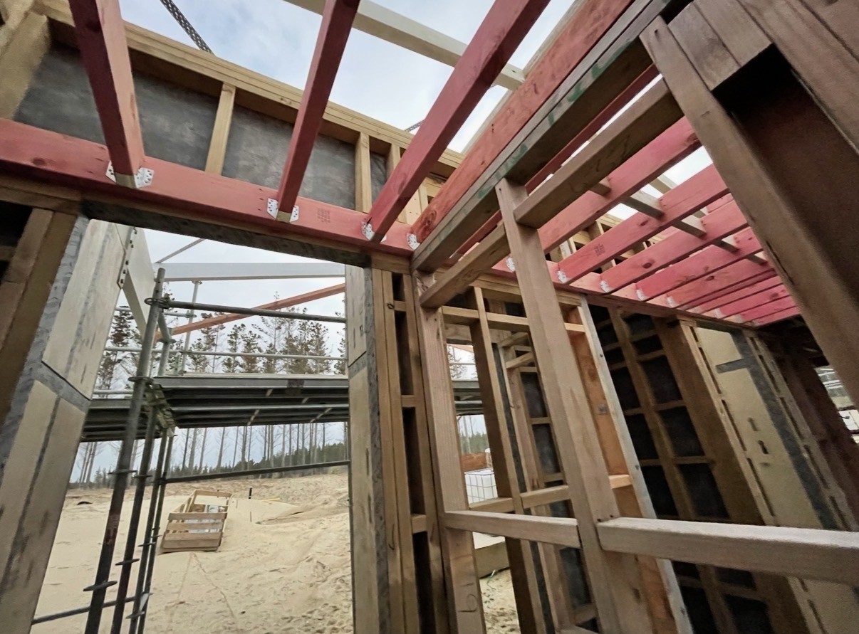 Timber roof and wall framing during construction.