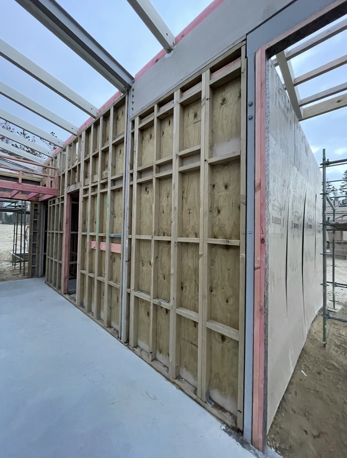 Timber wall framing and structural steel.